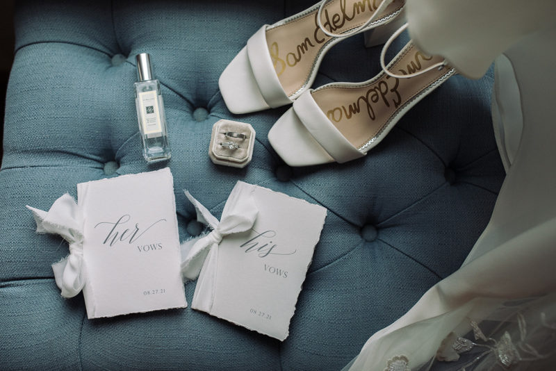bride's shoes, perfume, jewelry, and vows
