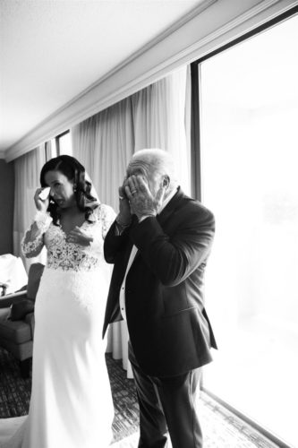bride's first look with her father, both crying