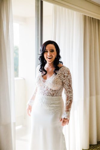 bride smiling in wedding gown