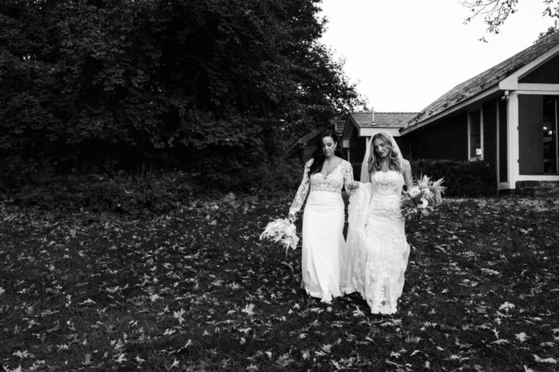 two brides walking together
