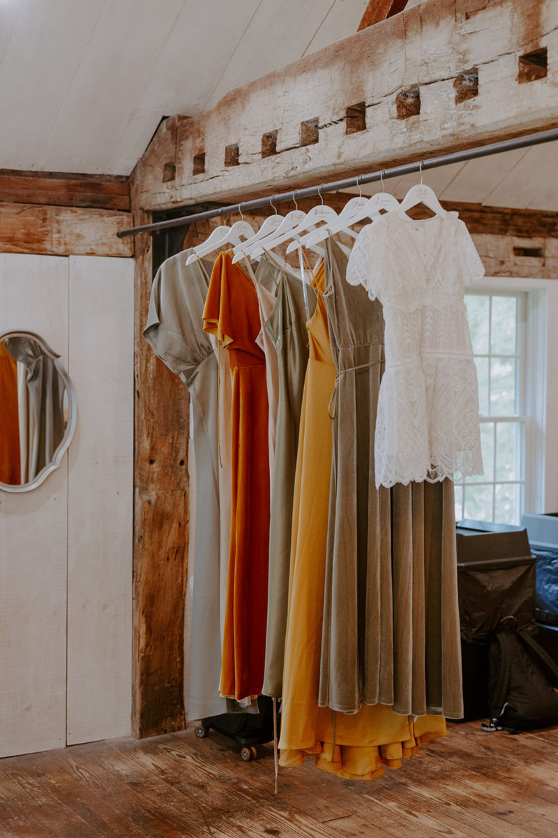 bridesmaids dresses hanging in bridal suite