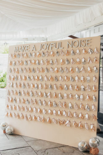 wedding seating chart made up of noise makers