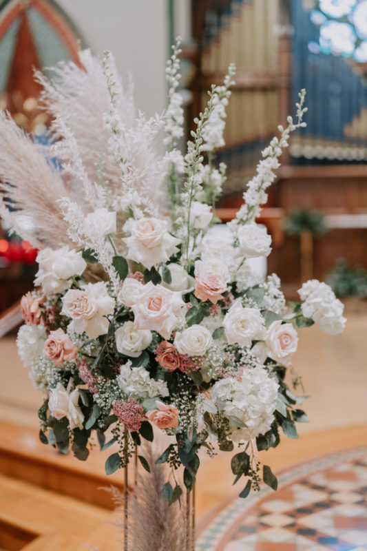 floral arrangement on church altar