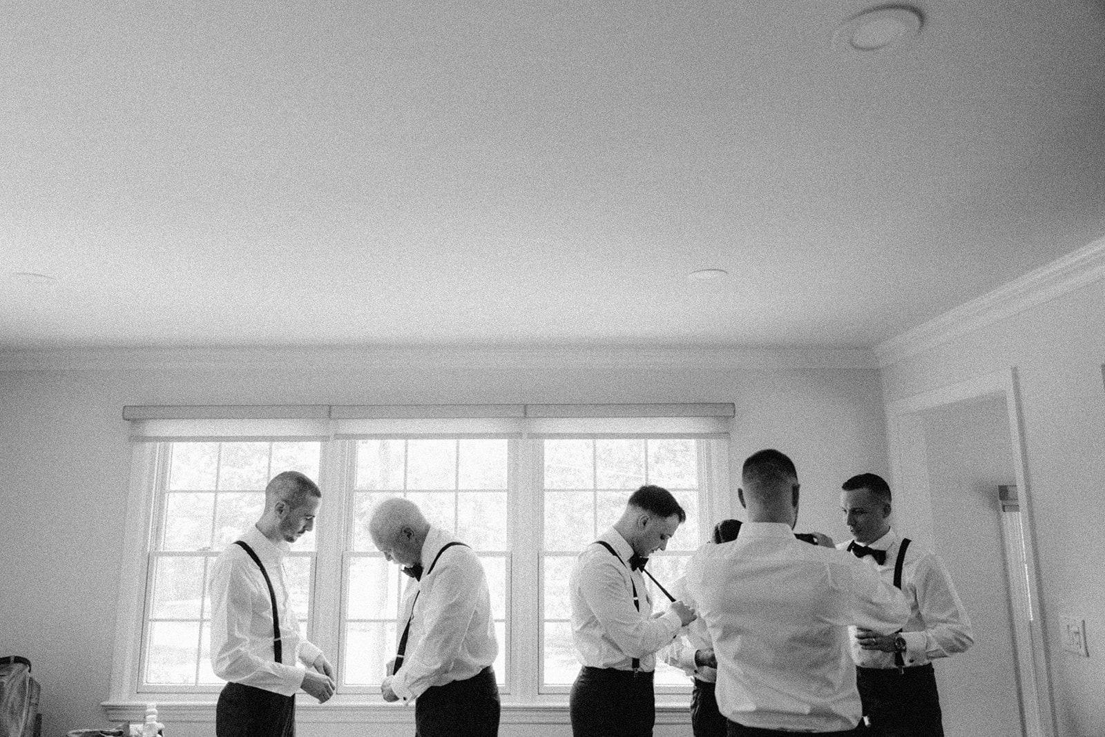 Groomsmen getting ready in the Pequest Parlour