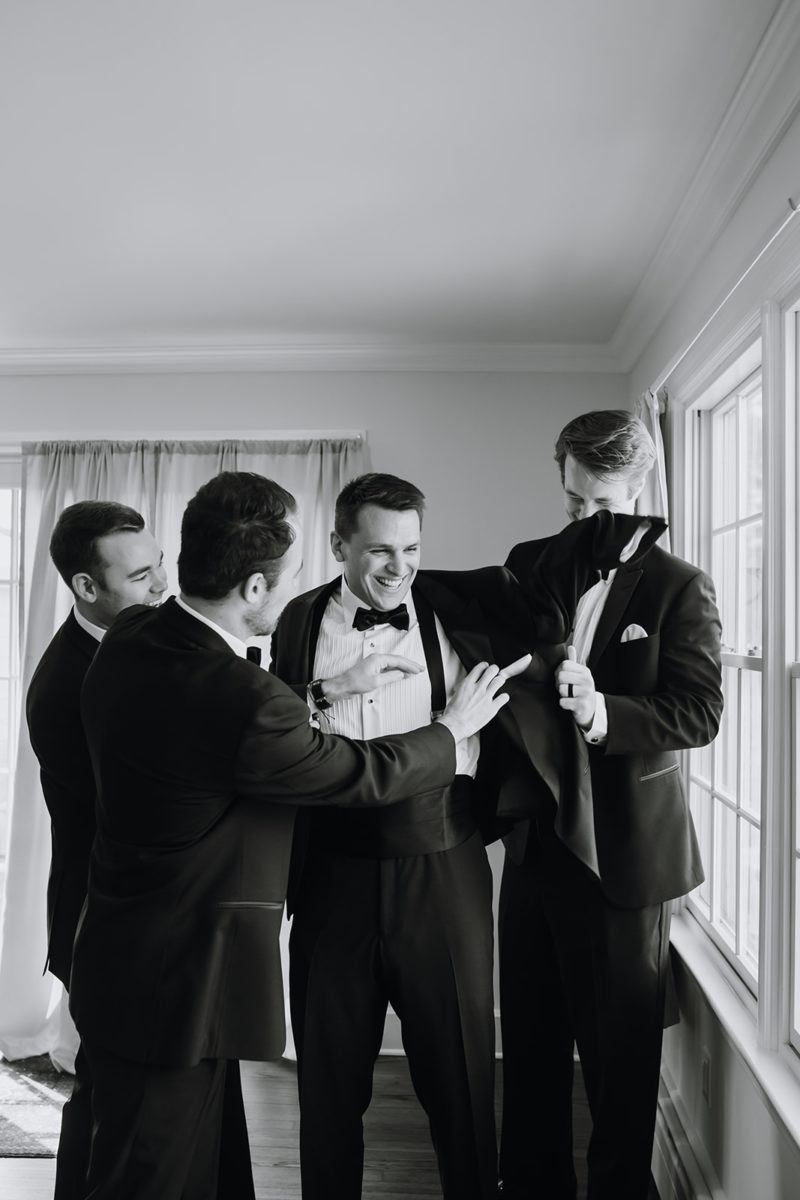 Groom getting ready with his groomsmen