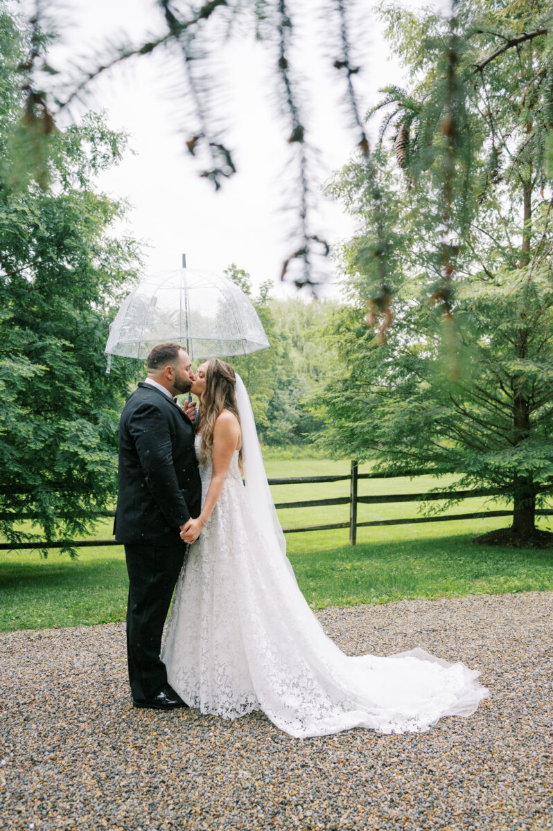 rain on your wedding day portrait, stone driveway