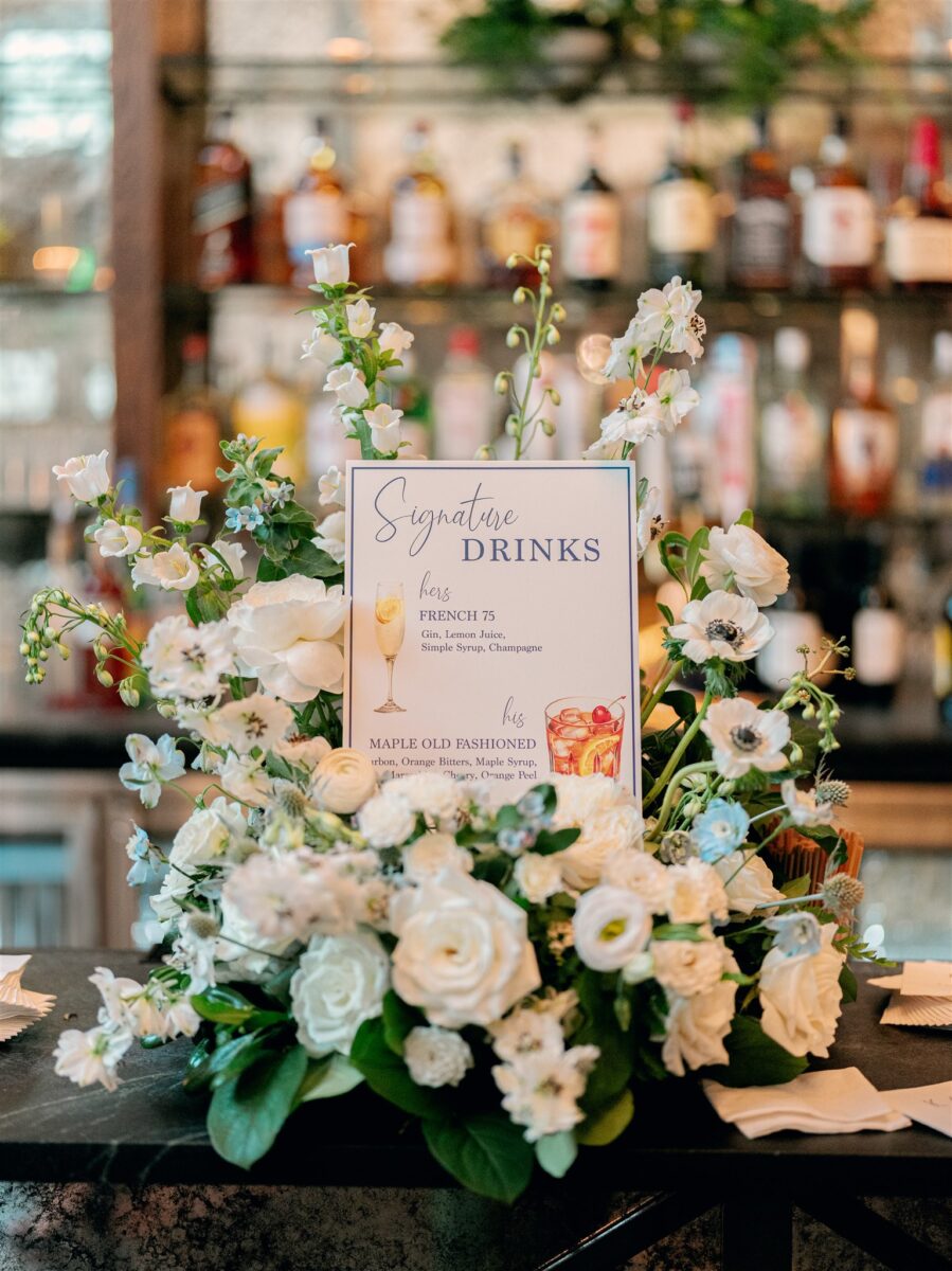 Signature Drink Sign surrounded by blue and white florals