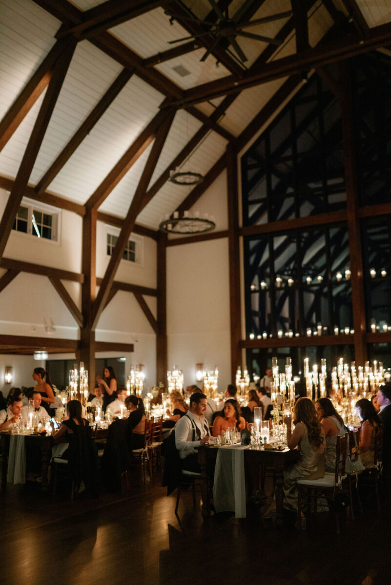 Candlelit wedding reception in the Farmhouse during a winter evening