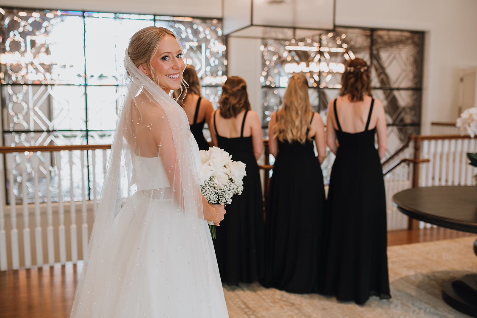 Bride's first look with bridesmaids at Crossed Keys Estate