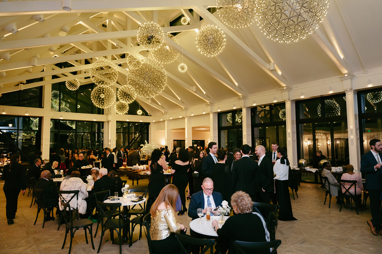 Glowing Glass Conservatory at Wedding Night Wedding. Crossed Keys Estate's cocktail hour.