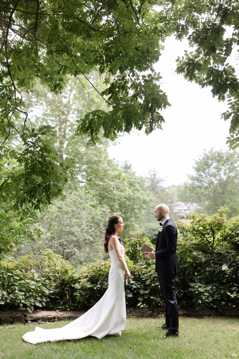 Couple exchanging vows on Crossed Keys Estate property. Summer Wedding Venue