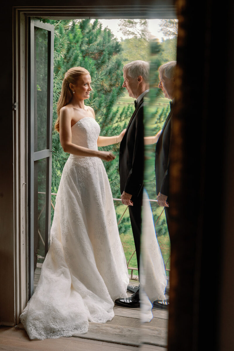 Bride sharing emotional first look with her father at Crossed Keys Estate