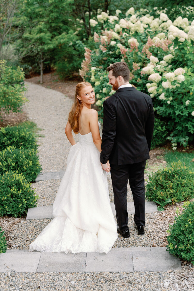 Candid couple portraits in the Crossed Keys Estate garden