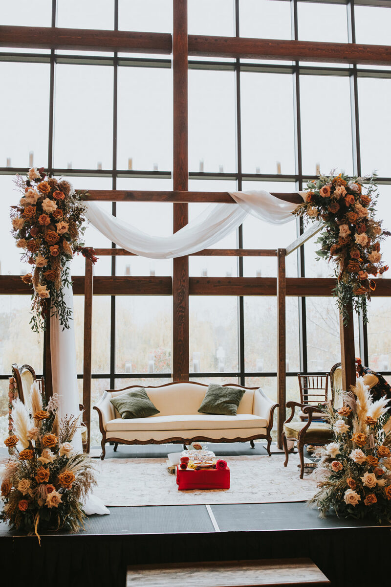 Hindu ceremony mandap setup inside Farmhouse Crossed Keys Estate Indian wedding NJ. Indian wedding ceremony florals blush cappuccino roses and pampas grass mandap Crossed Keys Estate New Jersey