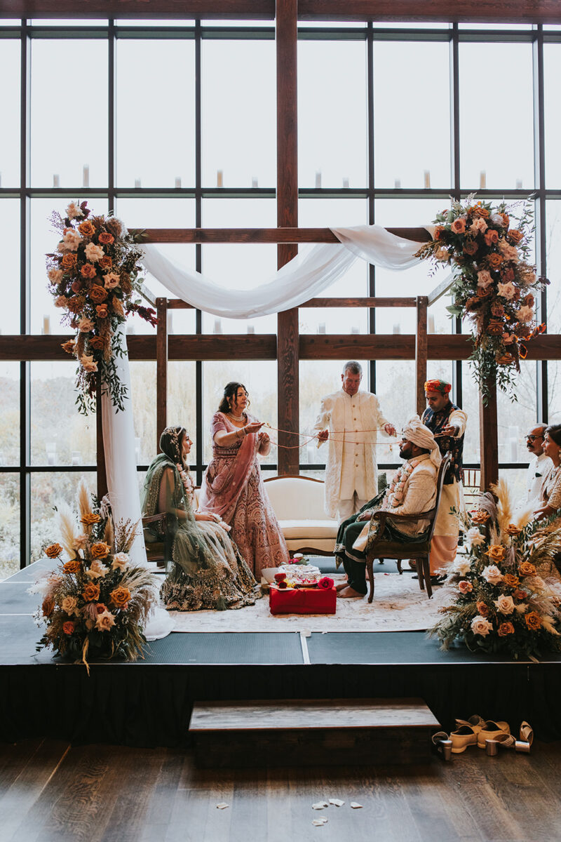 Hindu wedding ceremony stage setup inside Crossed Keys Estate Farmhouse New Jersey wedding venue