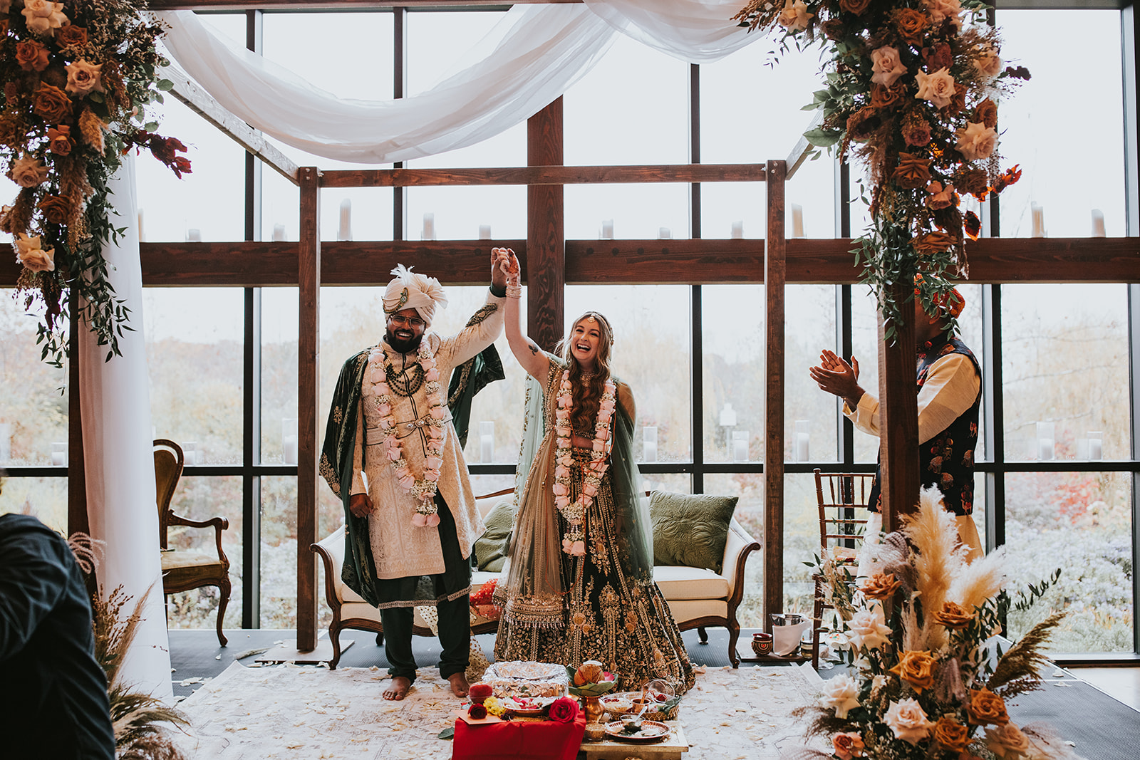 Hindu wedding ceremony with bride in lehenga and groom in sherwani Crossed Keys Estate