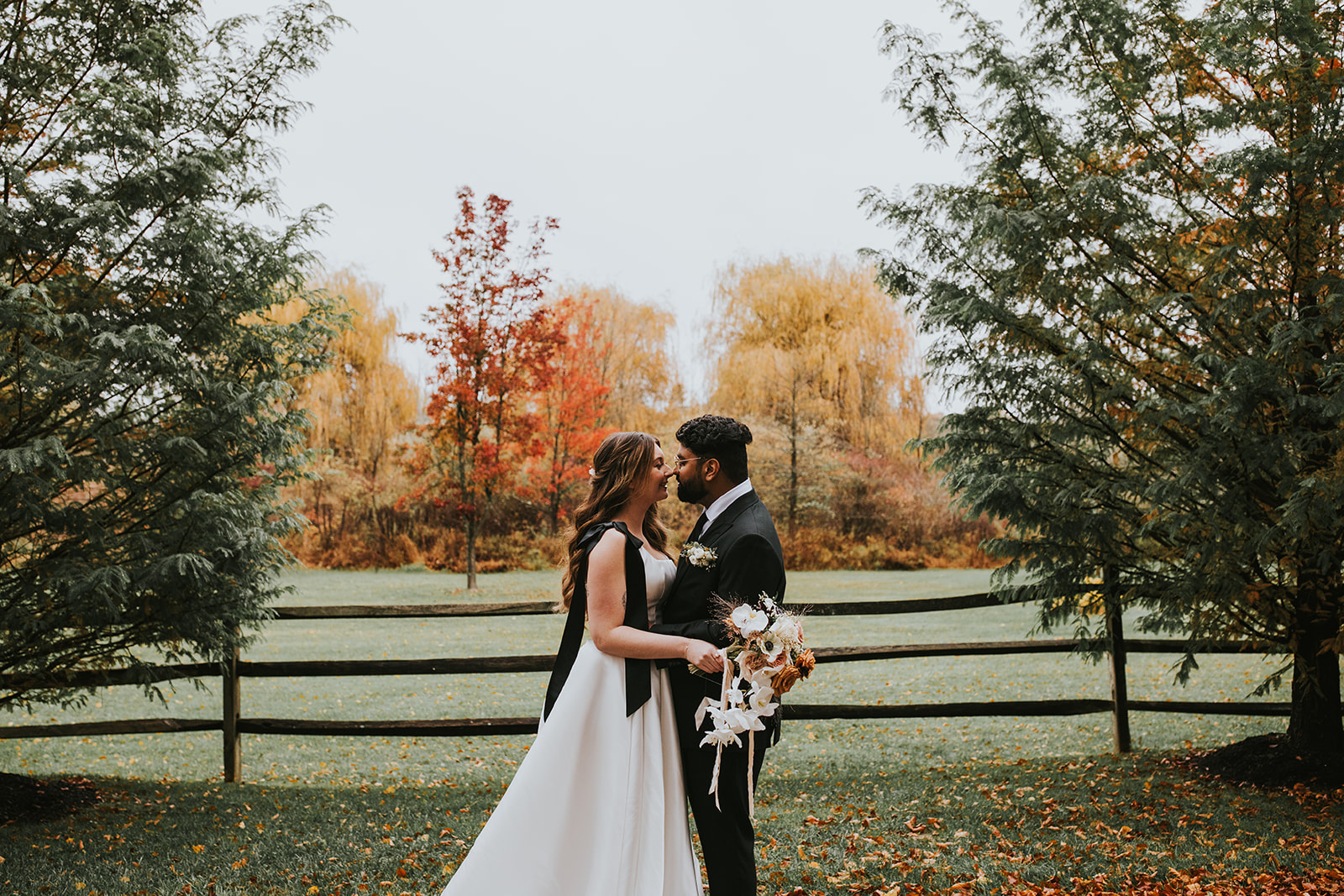 Bride and groom romantic portrait fall colors Crossed Keys Estate Hindu-American wedding