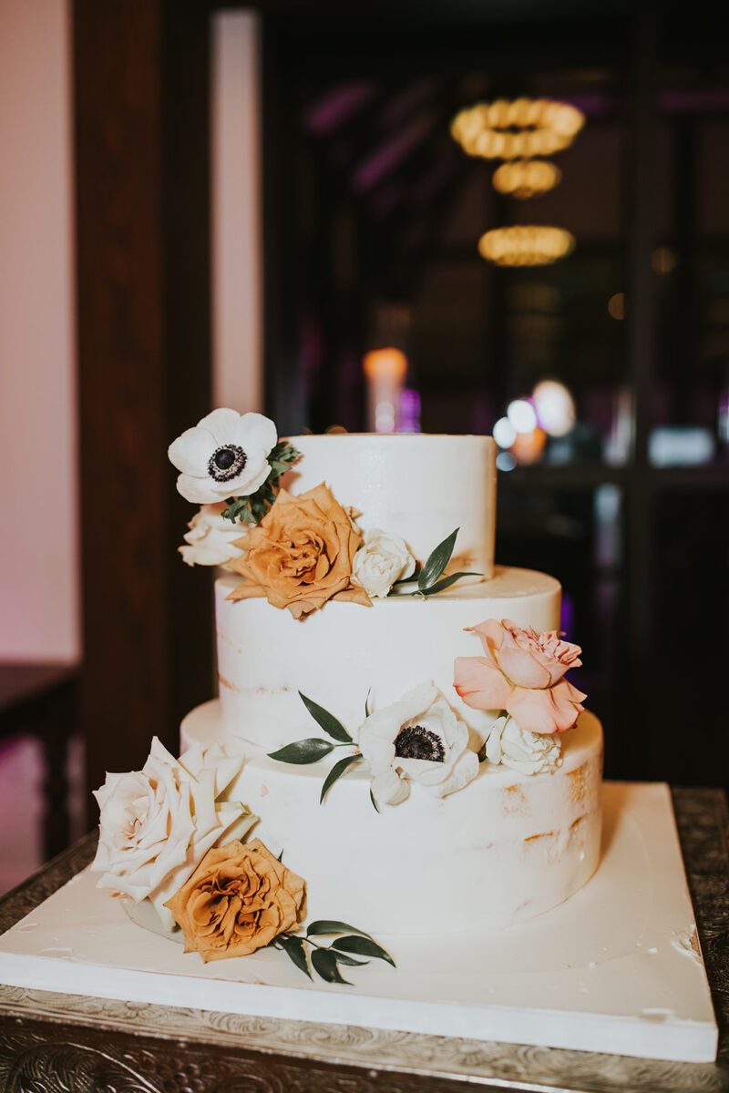 Boho chic Wedding cake cutting reception Crossed Keys Estate fall wedding