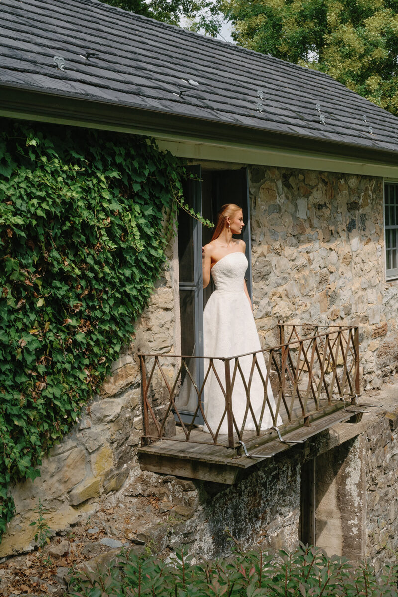 Morning bridal portraits on the garden balcony