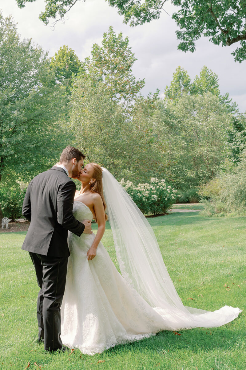 Bride and Groom Portraits with limelight hydrangea bushes in the background at New Jersey estate wedding venue
