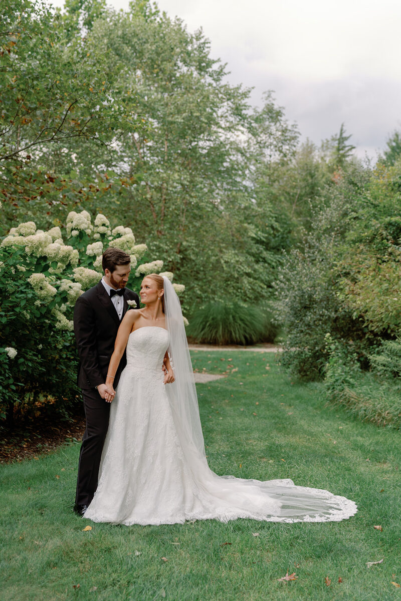 Bride and Groom Wedding Portraits with Lush Late Summer Limelight Hydrangeas