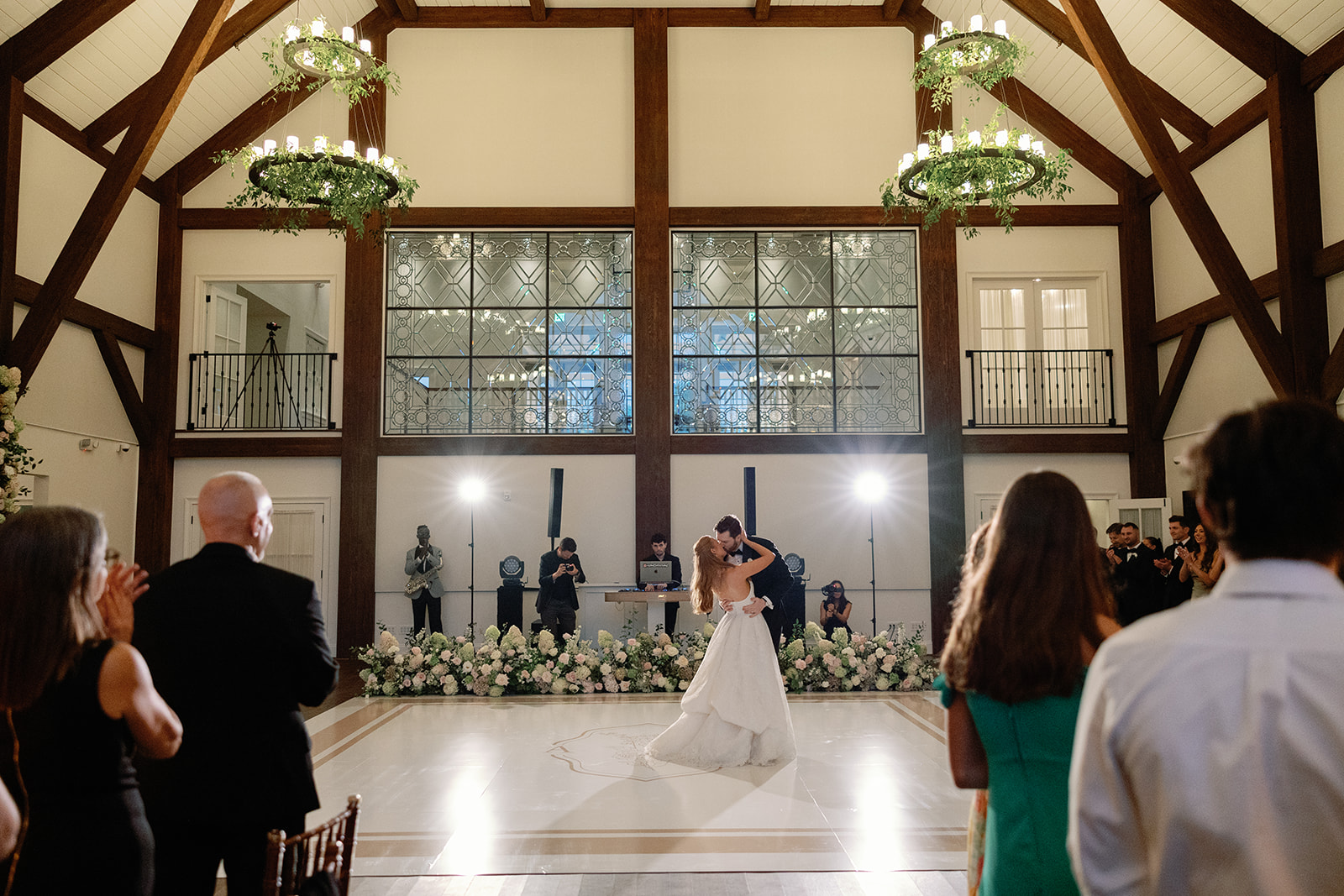 Ethereal wedding design. First dance as newlyweds. Farmhouse Wedding Venue in New Jersey. Bride and groom’s first dance under chandeliers at Crossed Keys Estate.