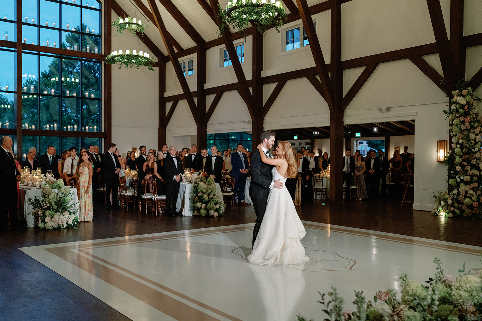Ethereal wedding design. First dance as newlyweds. Farmhouse Wedding Venue in New Jersey. Custom monogrammed wedding dance floor in Farmhouse reception space