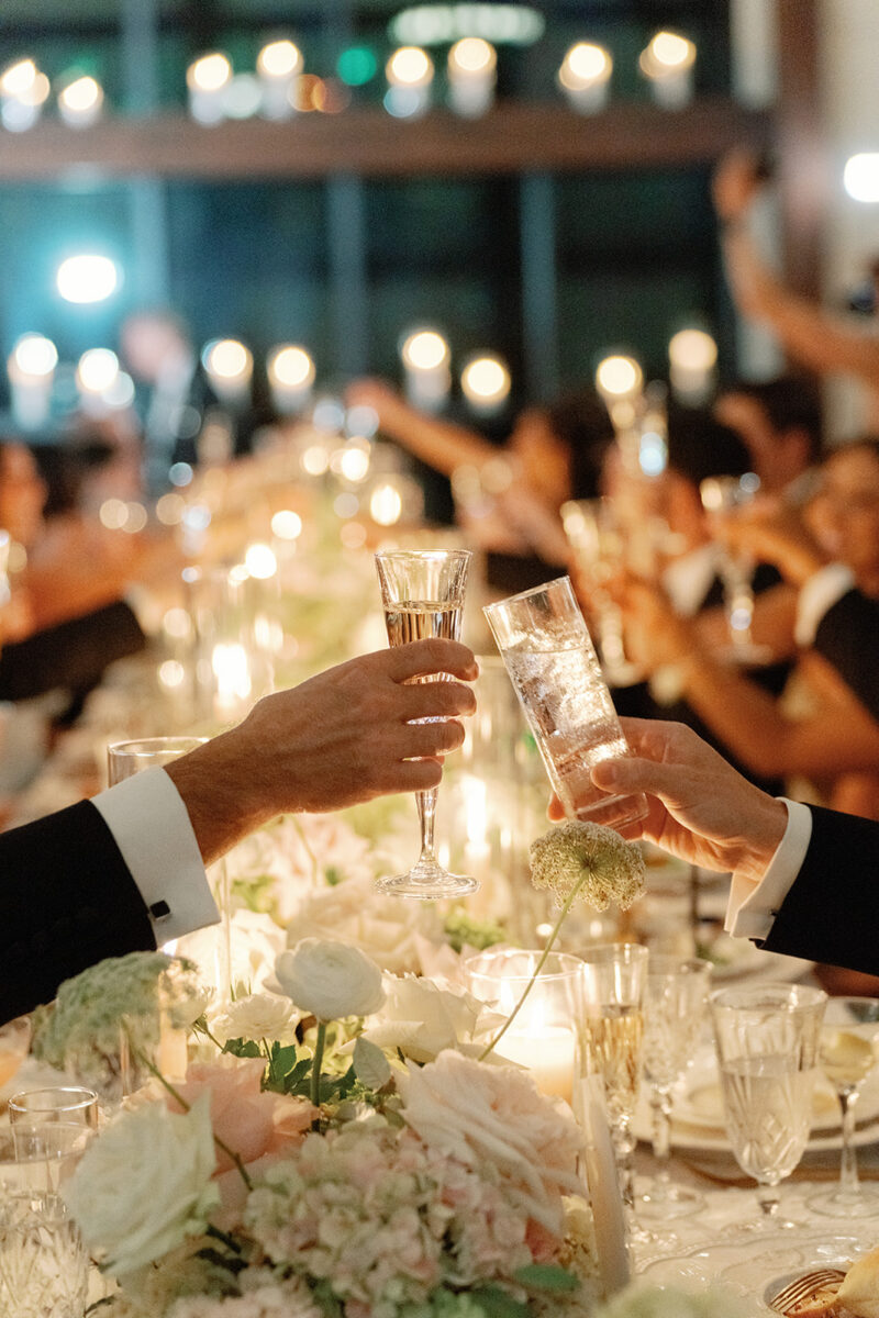 Toast to the newlyweds. Dinner and speeches at Crossed Keys Estate.