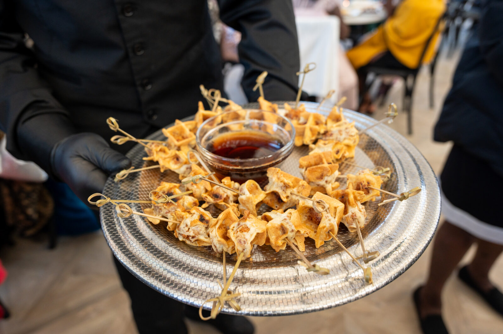 Silver Platter of Chicken & Waffle Bites with Hot Honey Maple Syrup