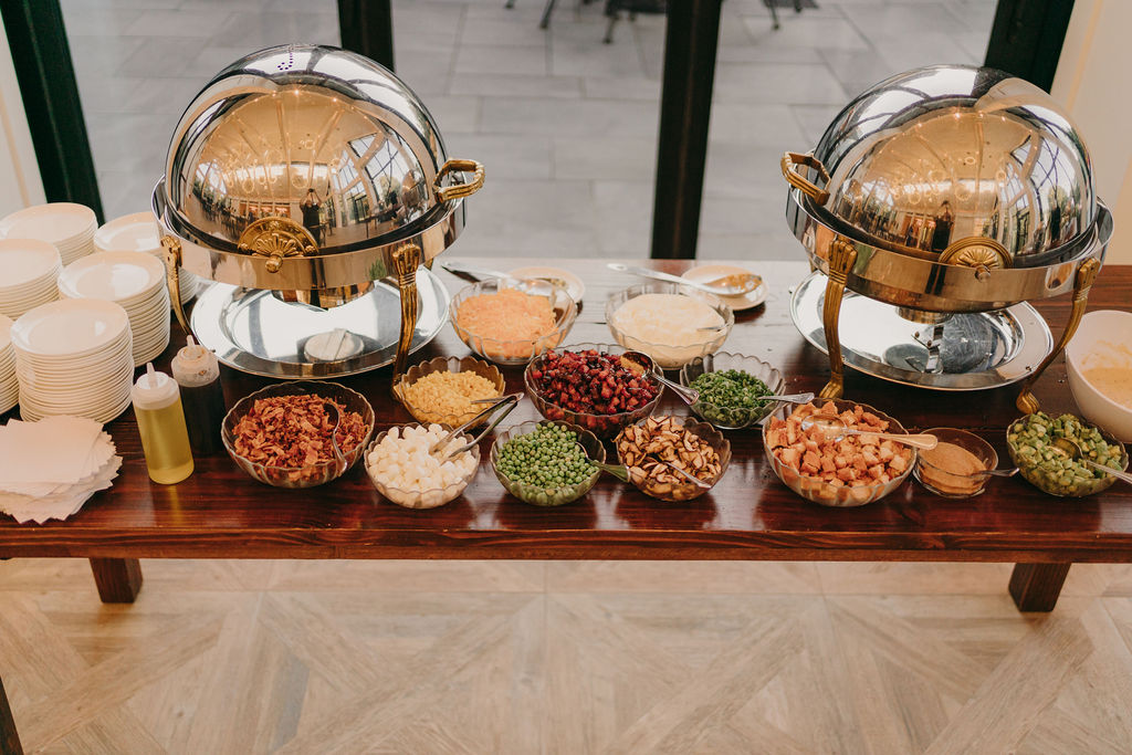 Mashed potato cocktail hour station with toppings