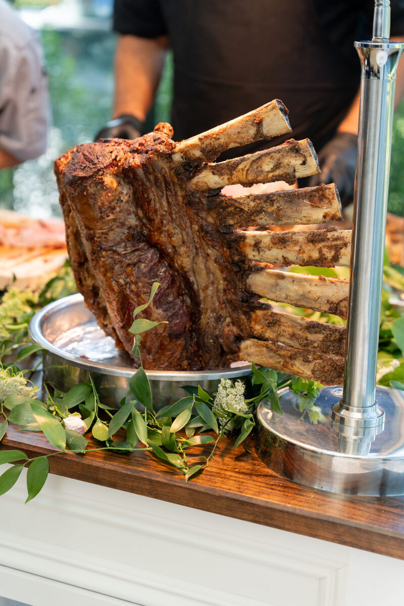 bone in tomahawk steak carving station